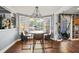 Breakfast nook with lake view and built-in shelving at 3228 Rosebud Rd, Loganville, GA 30052