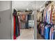 Large walk-in closet with ample hanging space and shelving at 3228 Rosebud Rd, Loganville, GA 30052