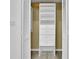 Walk in closet with white shelving and drawers at 411 Berkeley Woods Dr, Duluth, GA 30096