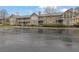 Condominium complex exterior highlighting multiple units, balconies, and attractive curb appeal at 411 Berkeley Woods Dr, Duluth, GA 30096