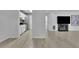 The living room flows into the open kitchen and dining area, creating a spacious layout at 411 Berkeley Woods Dr, Duluth, GA 30096