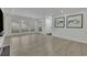 Sun-lit living room boasting new floors and large windows at 411 Berkeley Woods Dr, Duluth, GA 30096