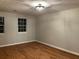 Spacious bedroom with hardwood floors and neutral walls at 1485 Reynolds Sw Rd, Atlanta, GA 30331