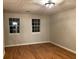 Spacious bedroom with hardwood floors and neutral walls at 1485 Reynolds Sw Rd, Atlanta, GA 30331