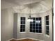 Dining room with bay window and chandelier at 1485 Reynolds Sw Rd, Atlanta, GA 30331