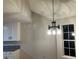 Dining room with chandelier and white cabinets at 1485 Reynolds Sw Rd, Atlanta, GA 30331