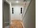 Bright entryway with hardwood floors and staircase at 1485 Reynolds Sw Rd, Atlanta, GA 30331