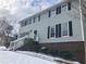 Two-story house with gray siding, brick base, and black shutters at 1485 Reynolds Sw Rd, Atlanta, GA 30331