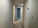 Neutral-toned hallway with carpet flooring at 1485 Reynolds Sw Rd, Atlanta, GA 30331