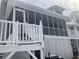 Screened porch with white railings and lattice at 1485 Reynolds Sw Rd, Atlanta, GA 30331