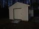 White shed with roll-up door at 1485 Reynolds Sw Rd, Atlanta, GA 30331