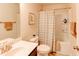 Clean bathroom with a shower/tub combo, toilet and vanity at 45 Silver Peak Dr, Covington, GA 30016