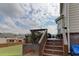 Wooden deck with stairs, planters and scenic backyard view at 45 Silver Peak Dr, Covington, GA 30016