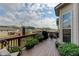 Relaxing deck with seating area, planters and neighborhood view at 45 Silver Peak Dr, Covington, GA 30016