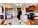 Spacious kitchen with granite countertops and dark wood cabinets at 45 Silver Peak Dr, Covington, GA 30016