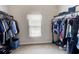 Large walk-in closet with double hanging rods at 45 Silver Peak Dr, Covington, GA 30016