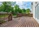 Spacious back deck with wood railings overlooking a landscaped yard, perfect for outdoor entertaining and relaxing at 59 Stafford Nw St, Atlanta, GA 30314