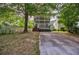 Charming exterior view of a two-story home with a black trim at 59 Stafford Nw St, Atlanta, GA 30314