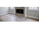 A close up view of the fireplace in the living room shows tile surround and painted mantle at 59 Stafford Nw St, Atlanta, GA 30314