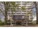 Renaissance Lofts building entrance with covered walkway, landscaping, and signage at 120 Ralph Mcgill Ne Blvd # 706, Atlanta, GA 30308