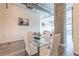 Modern dining area with glass top table and white chairs at 120 Ralph Mcgill Ne Blvd # 706, Atlanta, GA 30308