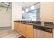 Modern kitchen with granite countertops, stainless steel appliances, and wood cabinets at 120 Ralph Mcgill Ne Blvd # 706, Atlanta, GA 30308