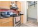 Modern kitchen with stainless steel appliances and wood cabinets at 120 Ralph Mcgill Ne Blvd # 706, Atlanta, GA 30308