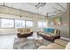 Spacious living room with floor to ceiling windows and city views at 120 Ralph Mcgill Ne Blvd # 706, Atlanta, GA 30308