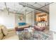 Open living area with modern furniture and exposed ductwork at 120 Ralph Mcgill Ne Blvd # 706, Atlanta, GA 30308
