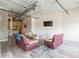 Bright and airy living room with large TV and comfy seating at 120 Ralph Mcgill Ne Blvd # 706, Atlanta, GA 30308