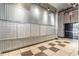 Well-lit mail room with numbered mailboxes and modern flooring at 120 Ralph Mcgill Ne Blvd # 706, Atlanta, GA 30308