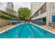 Resort-style pool with ample seating and city views at 120 Ralph Mcgill Ne Blvd # 706, Atlanta, GA 30308