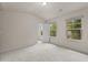 Bedroom with lots of light, carpet and three windows at 2396 Whiteoak Se Bnd # 16, Smyrna, GA 30080