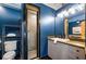 Modern bathroom with a walk-in shower and dark blue walls at 400 Village Ne Pkwy # 120, Atlanta, GA 30306