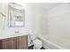 Clean bathroom with a vanity, toilet, and bathtub at 5547 Strathmoor Manor Cir, Lithonia, GA 30058