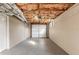 Unfinished basement garage with overhead door at 2473 Tyler Way, Decatur, GA 30032