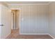 Bedroom with neutral walls and carpet flooring, access to hallway at 2473 Tyler Way, Decatur, GA 30032
