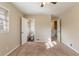 Primary bedroom with carpet flooring and access to bathroom at 2473 Tyler Way, Decatur, GA 30032