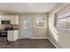 Dining area with hardwood floors and access to kitchen at 2473 Tyler Way, Decatur, GA 30032