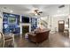 Open floor plan basement with built-in shelving, a fireplace, and hardwood floors at 1159 Morley Se Ave, Atlanta, GA 30312