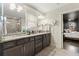 Double vanity bathroom with granite countertops and a view of bedroom at 1159 Morley Se Ave, Atlanta, GA 30312