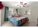 Cozy bedroom with a queen-size bed and colorful bedding at 1159 Morley Se Ave, Atlanta, GA 30312