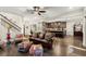 Open concept living room with hardwood floors, a view of the kitchen, and comfortable seating at 1159 Morley Se Ave, Atlanta, GA 30312