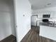 Modern kitchen with white cabinets and granite countertops at 1394 Ben Park Way, Grayson, GA 30017