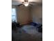 Empty bedroom with ceiling fan and window at 3195 Newcastle Way, Snellville, GA 30039