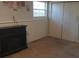 Basement bedroom with closet, window, and brick accent wall at 3195 Newcastle Way, Snellville, GA 30039