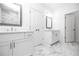 Elegant bathroom with double vanity, marble flooring, and a shower at 705 Dodd N Ln # 163, Buford, GA 30518