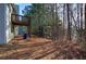 Spacious backyard with a deck and wooded privacy at 113 Omega Ct, Dallas, GA 30157