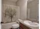 Bathroom with shower/tub combo and tree-themed shower curtain at 113 Omega Ct, Dallas, GA 30157