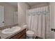 Clean bathroom with single sink vanity and shower/tub combo at 113 Omega Ct, Dallas, GA 30157